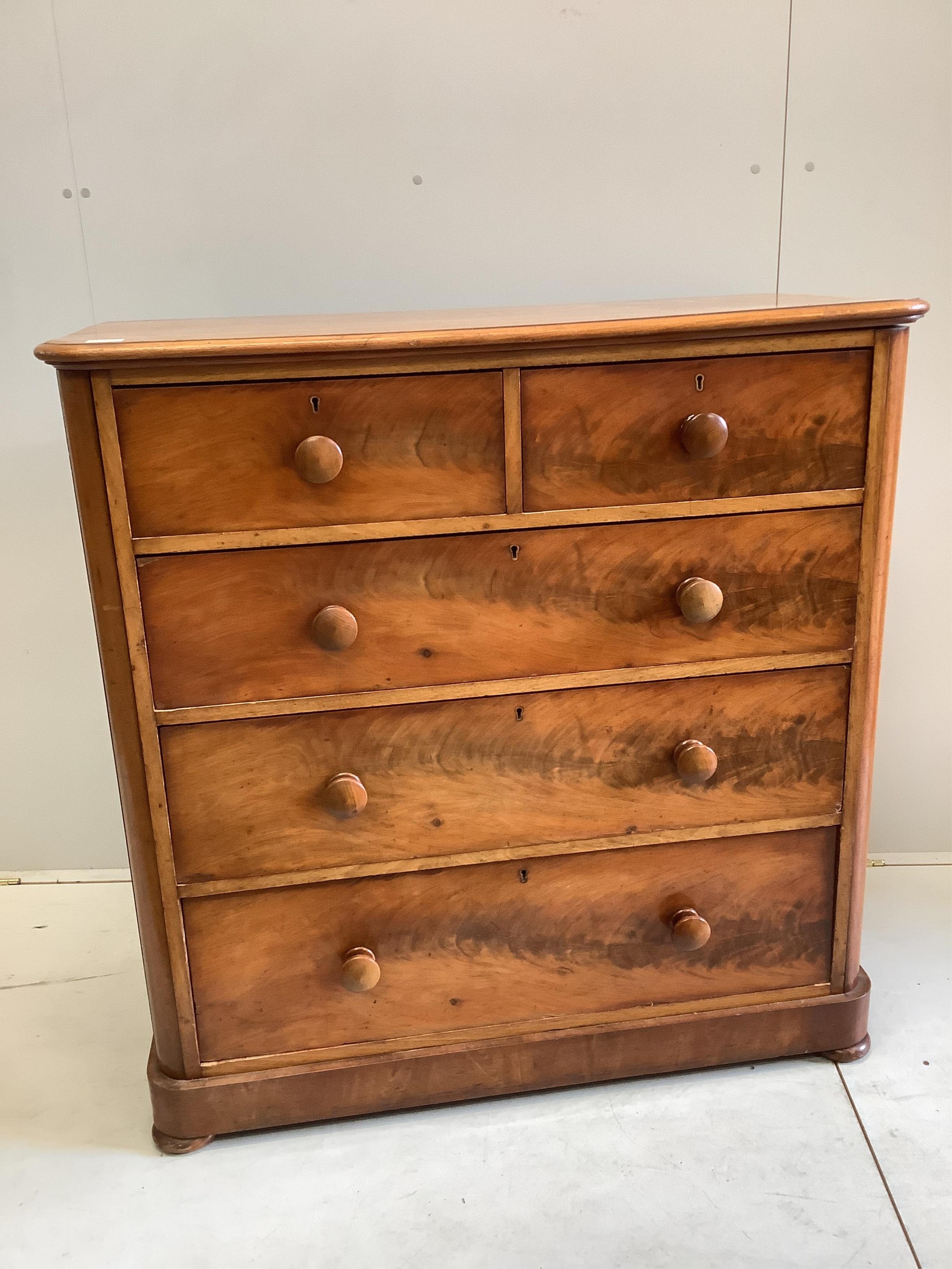 A Victorian mahogany chest of five drawers, width 111cm. depth 55cm, height 113cm. Condition - fair-good